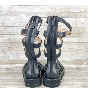 Stuart Weitzman Womens 6
Gala Lift Tall Gladiator Sandal
Black Leather Strap